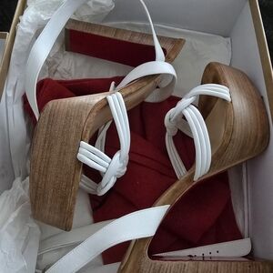 SOLD Christian Louboutin White and Brown Heels In Good Condition.Open To Offers.